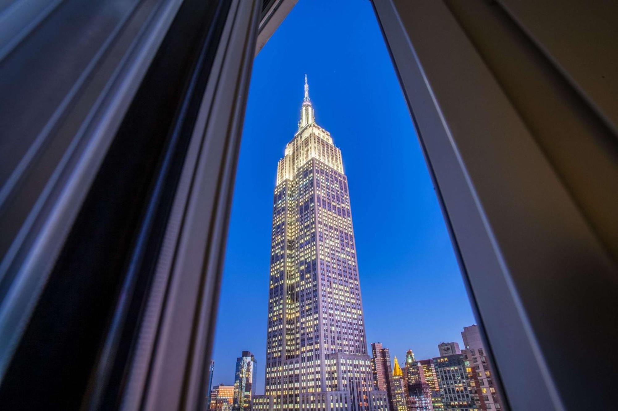 Double Room with Two Double Beds and City View,1765583090:JPEG