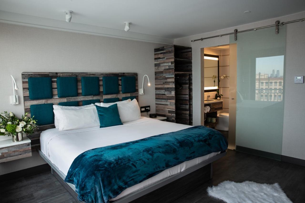 Habitación Deluxe Signature Collection con terraza y vistas a Manhattan - Cama extragrande